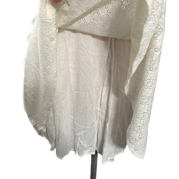 Free People ivory dress in size 0. See through design on waist. - Picture 10 of 12